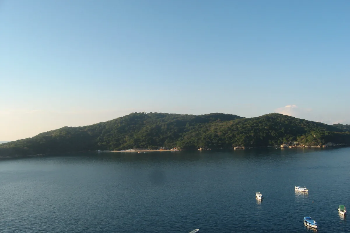 La Roqueta Island across calm water from the Acapulco shore