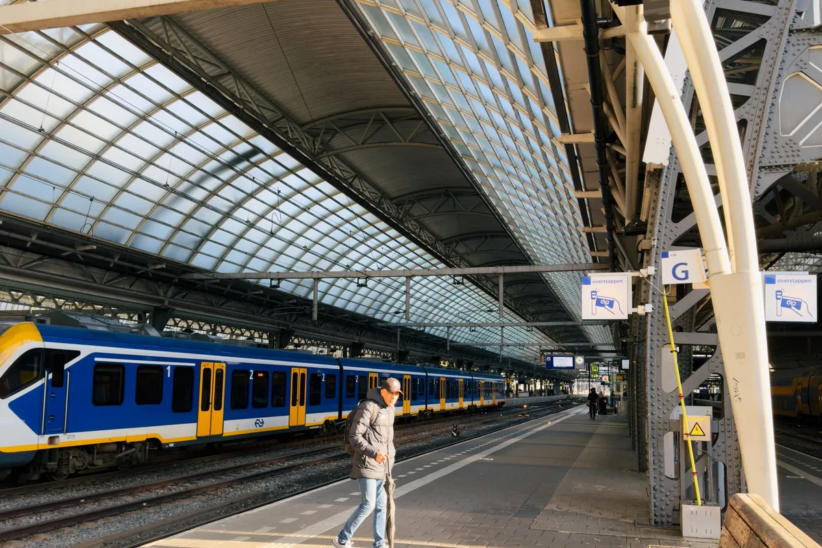 An NS train waiting at the platform