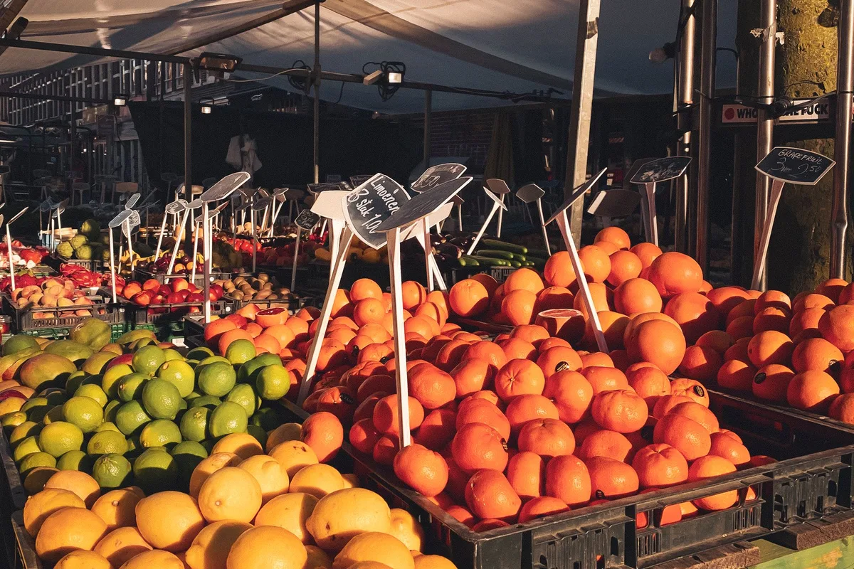 A fruit stall in the sun at an Amsterdam street market