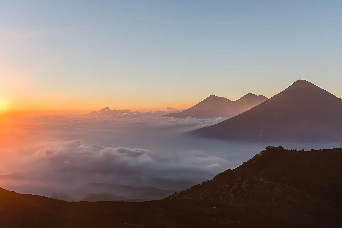 Sunrise above a sea of cloud from the slopes of Pacaya volcano