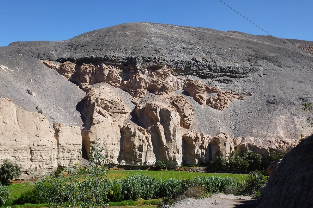 Carved sillar cliffs at the Añashuayco quarry on the Ruta del Sillar