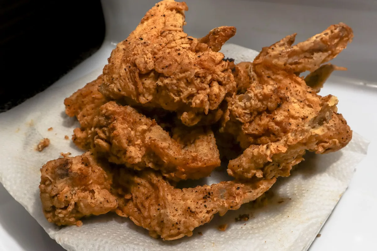 Crispy fried chicken fresh from the fryer