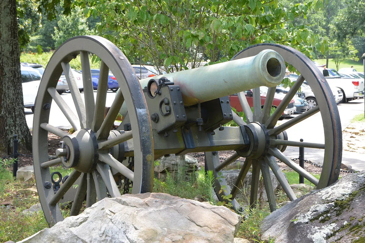 A Civil War cannon among the trees at Kennesaw Mountain National Battlefield Park