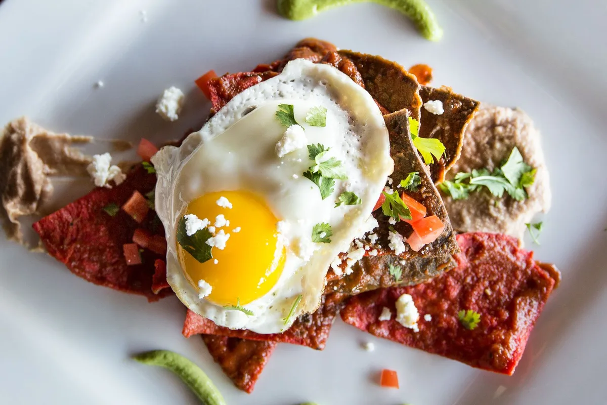 Chilaquiles with a fried egg, the classic Mexican breakfast plate