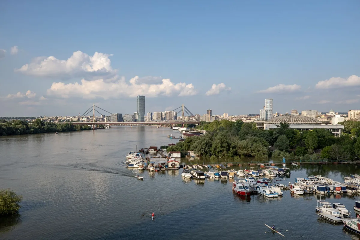 Houseboats and marinas on the Danube below the Ada Bridge in summer