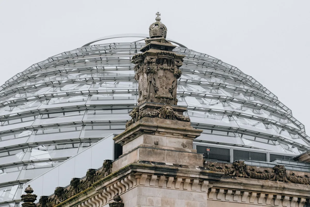The glass dome of the Reichstag above its stone facade