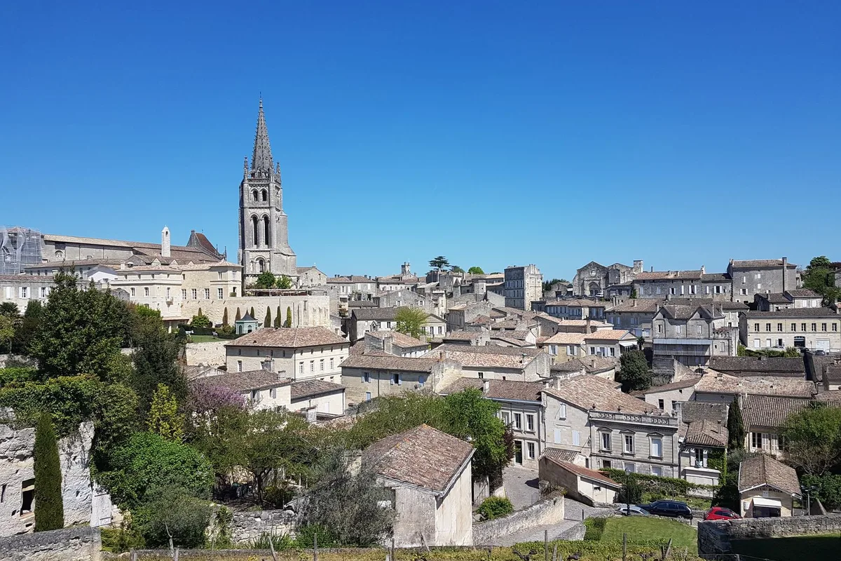 Saint-Émilion from the vineyards, the monolithic church spire above the rooftops