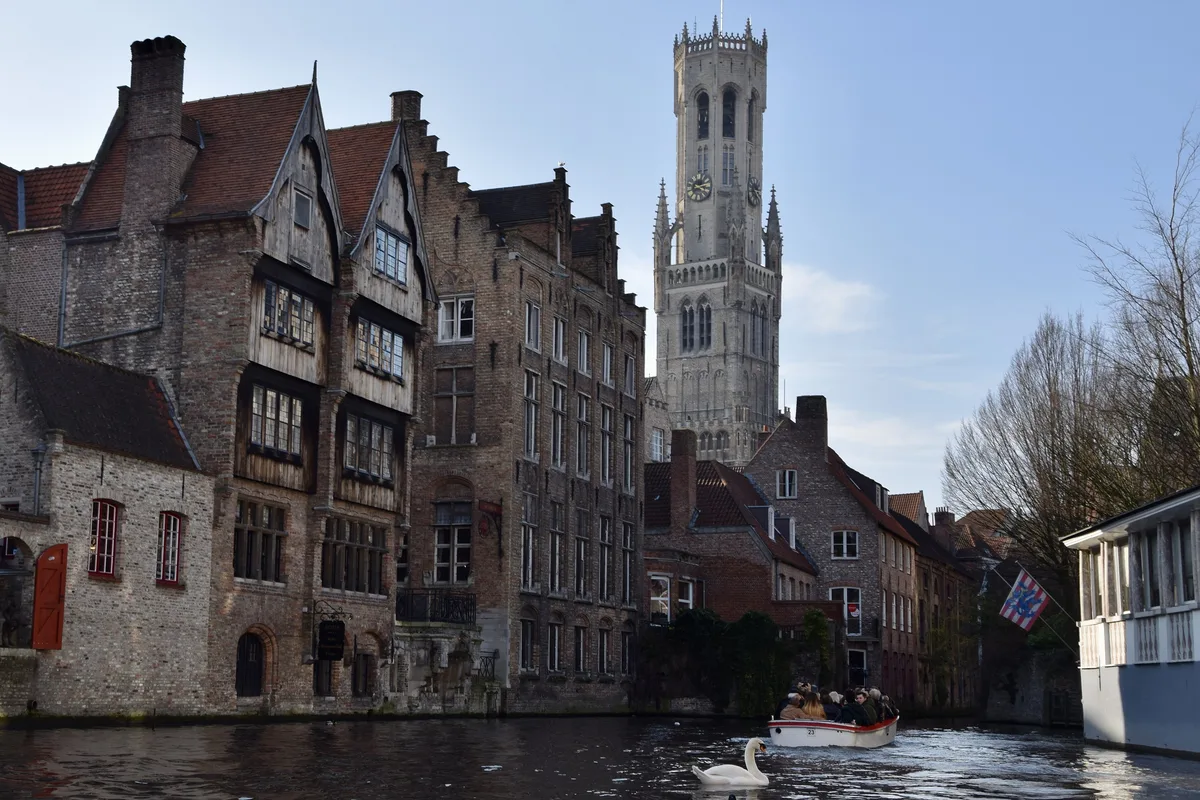 The Rozenhoedkaai canal and the Belfry in Bruges