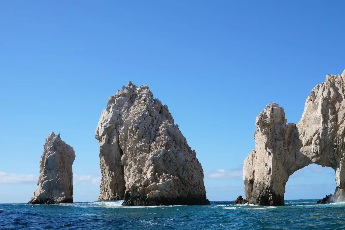 El Arco and the granite sea stacks of Land