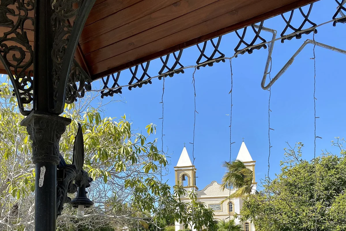 Plaza Mijares in San José del Cabo, the mission towers behind the trees