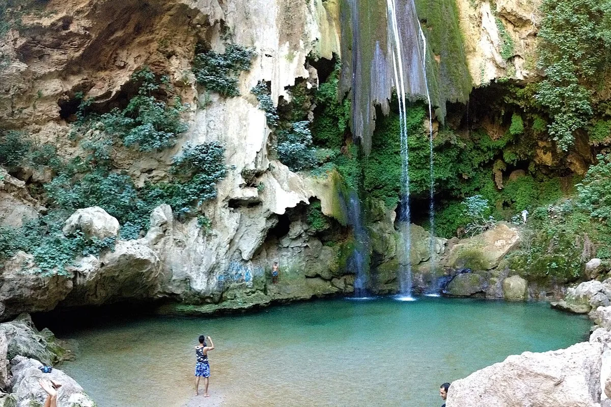 The Akchour waterfall dropping into its turquoise pool in Talassemtane National Park