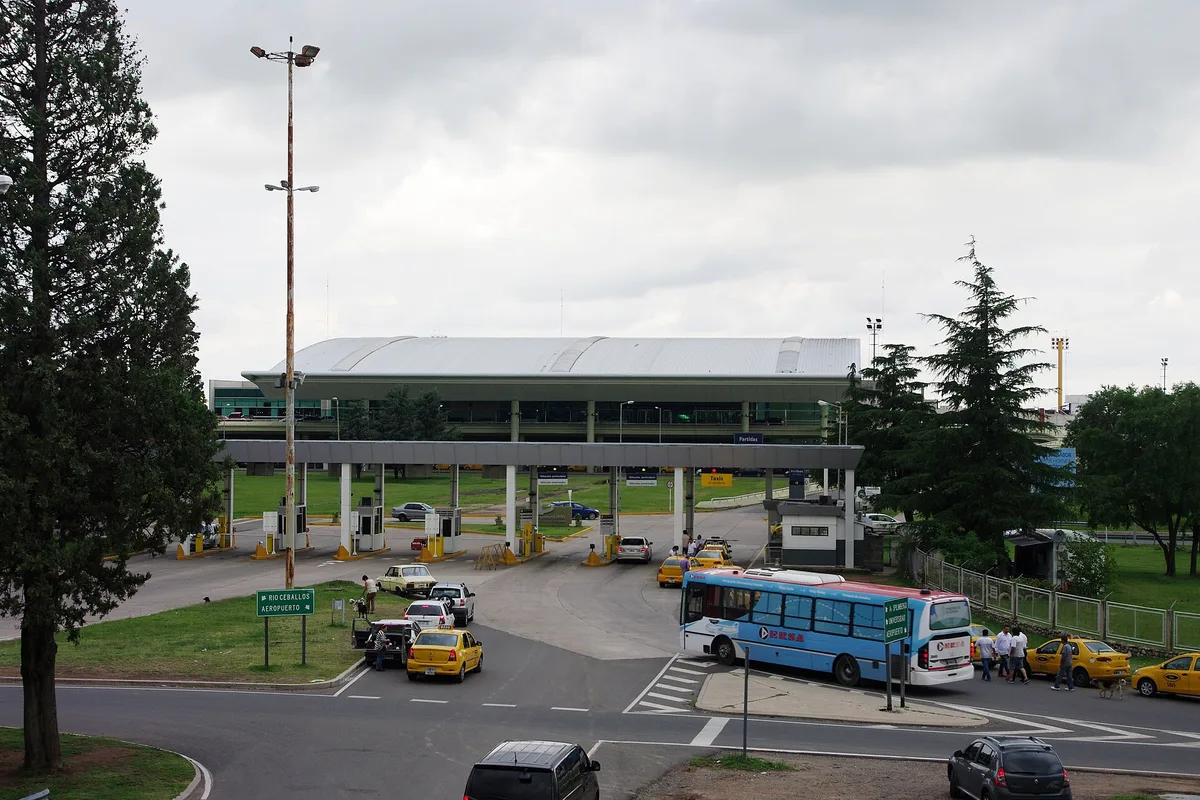 The entrance to Córdoba's Taravella Airport, with the blue Aerobus and yellow taxis outside