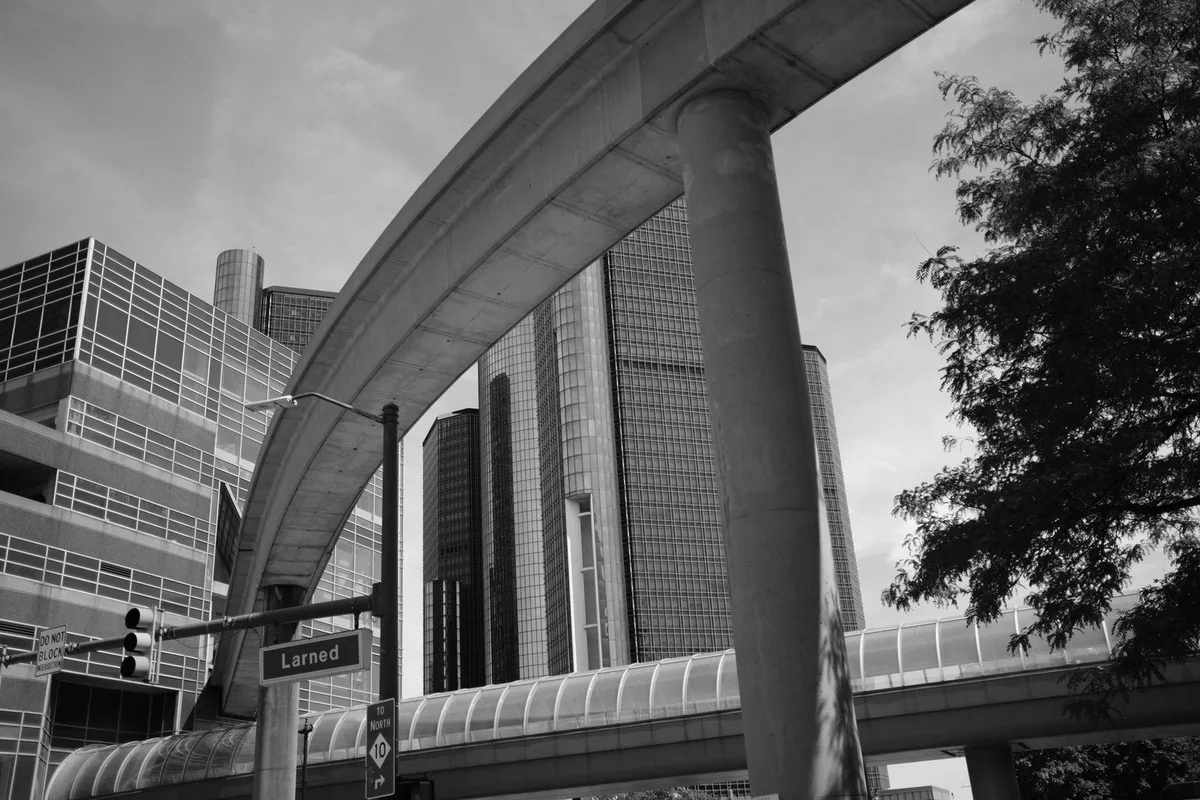 The Detroit People Mover's elevated track curving past the Renaissance Center