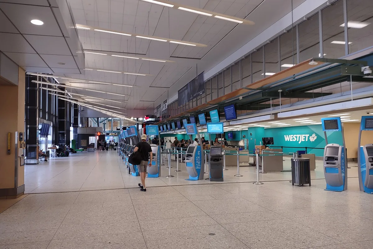 Check-in counters inside the terminal at Edmonton International Airport