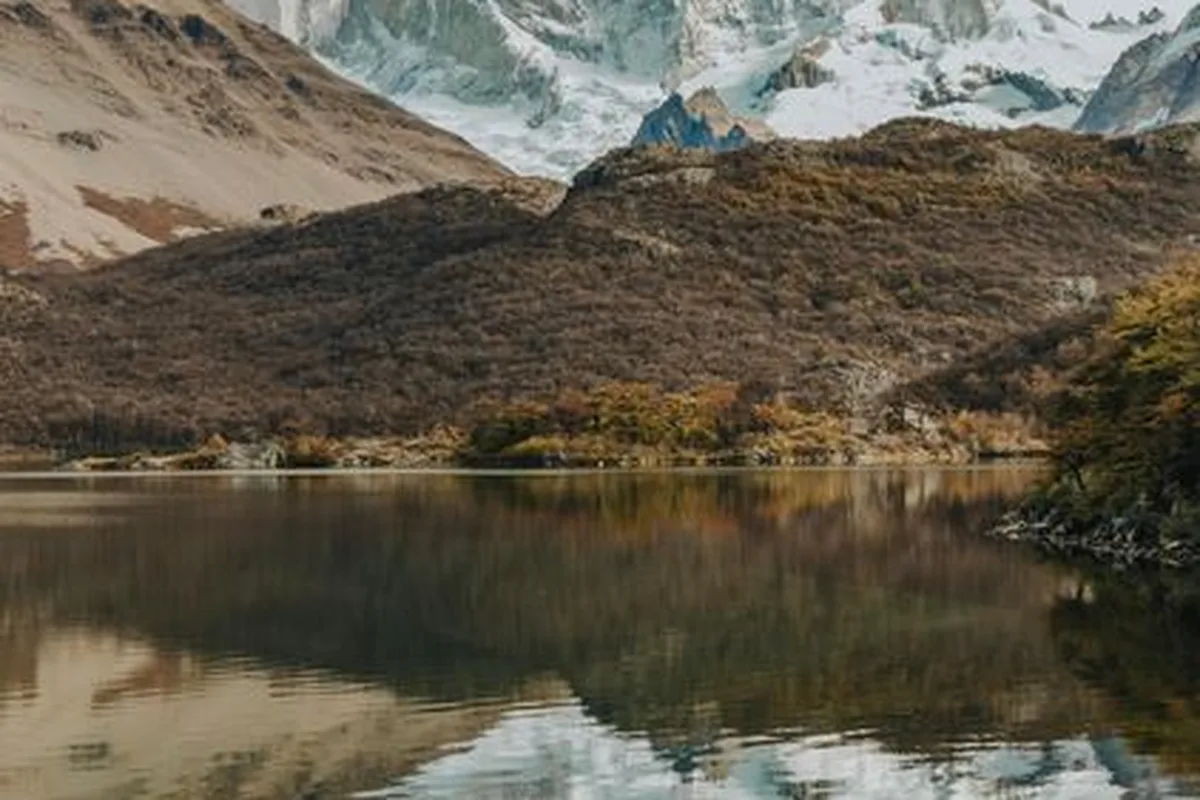 Fitz Roy reflected in a still lake near El Chaltén