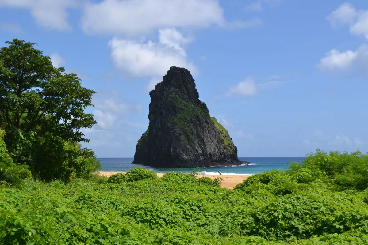 Morro do Pico rising behind Praia da Cacimba do Padre