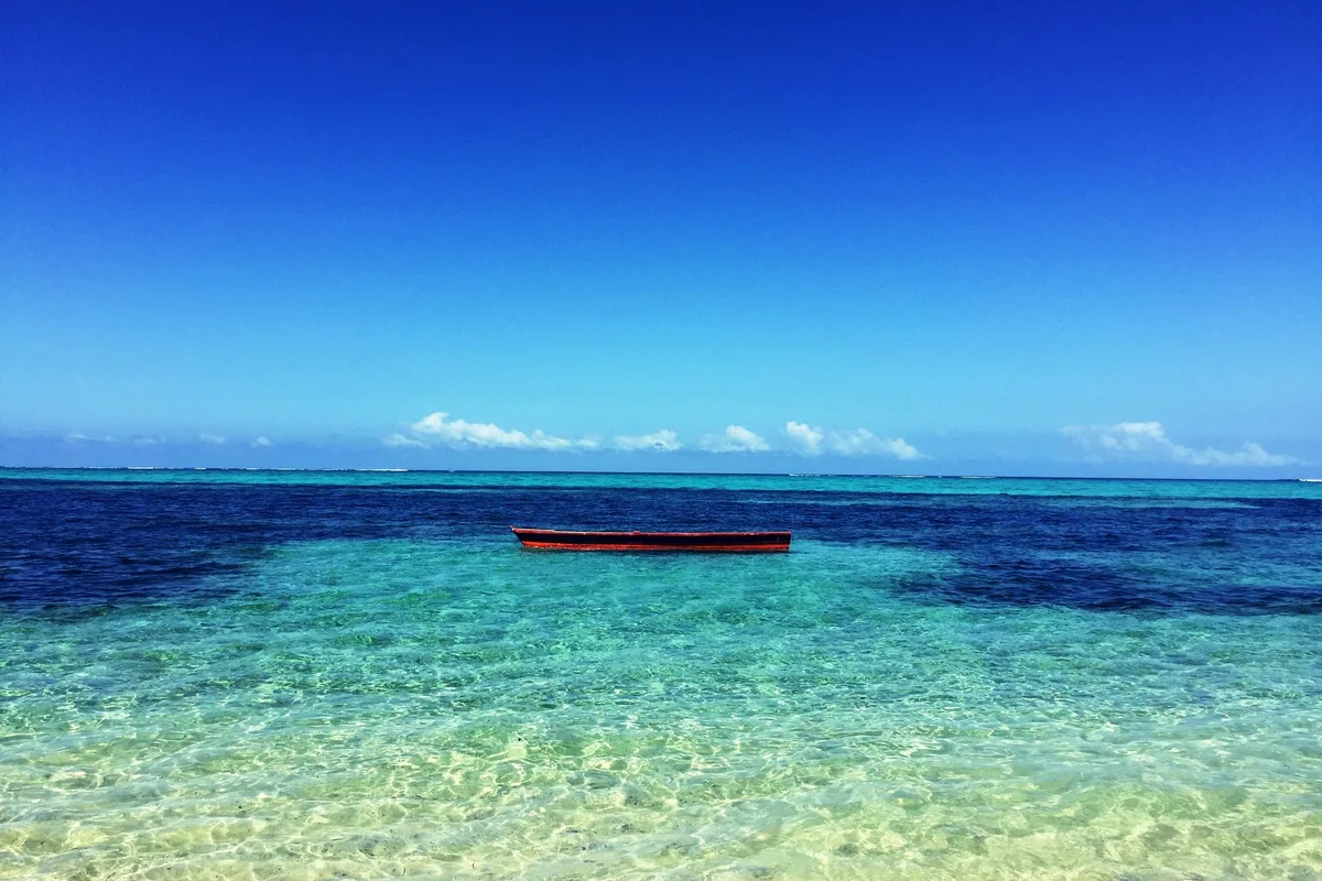 A local boat on the glassy lagoon off Nadi, the water every island trip starts on