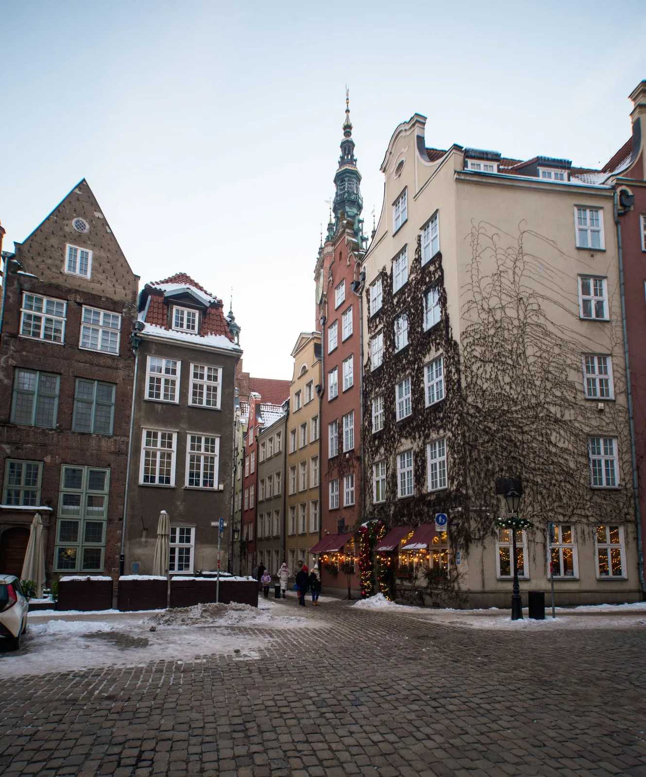 Merchant houses on a snowy cobbled street