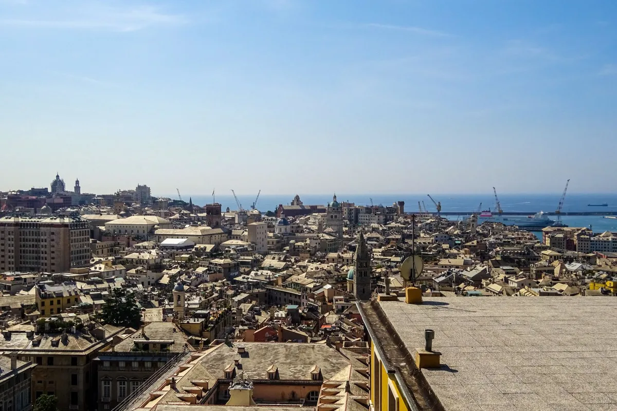Rooftops of Genoa's old town stretching towards the harbour