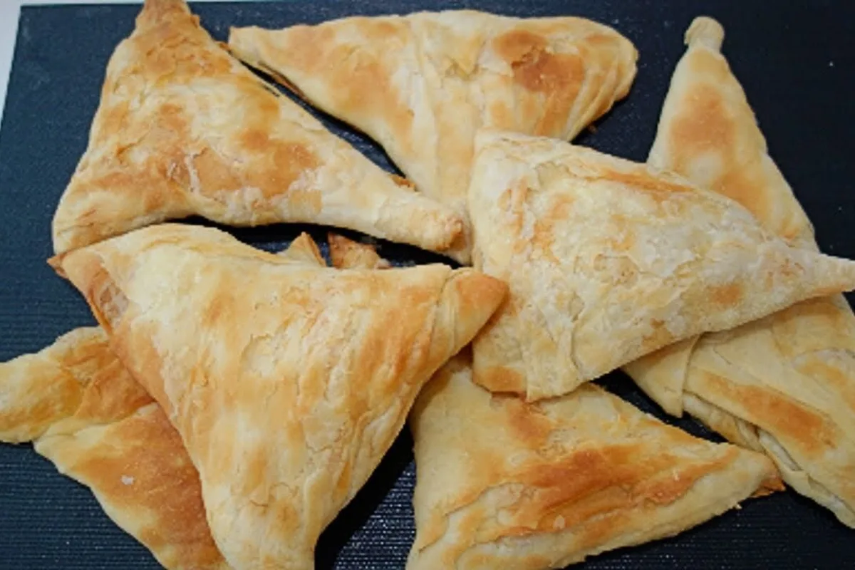 Albanian byrek, the flaky triangle pastry eaten across the south