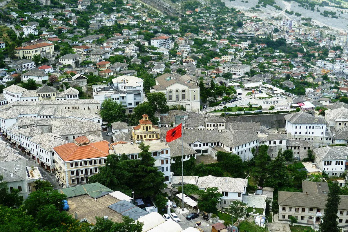 Gjirokaster's slate-roofed old town spread out below the castle hill