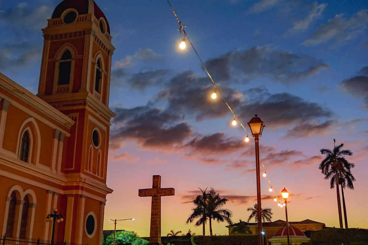 Granada Cathedral and Parque Central at dusk, Nicaragua