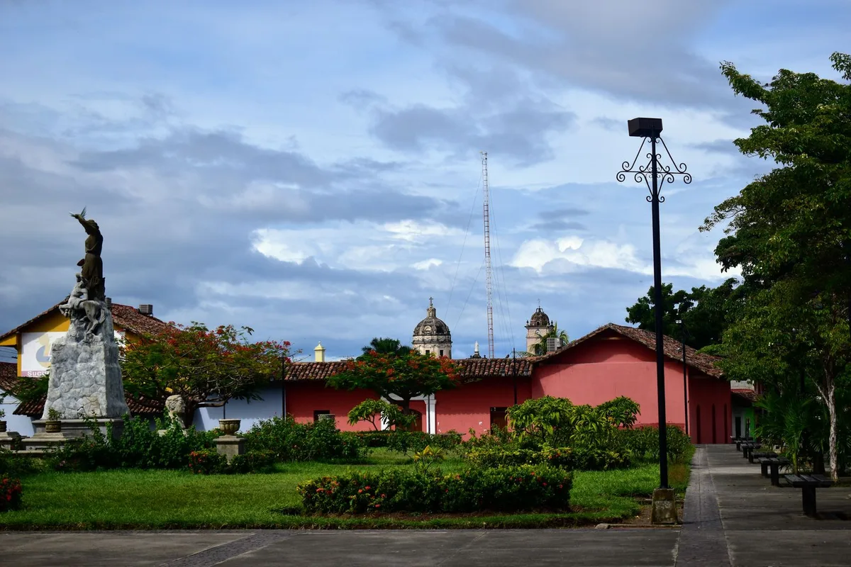 Parque Central in Granada, Nicaragua, with its statue and gardens