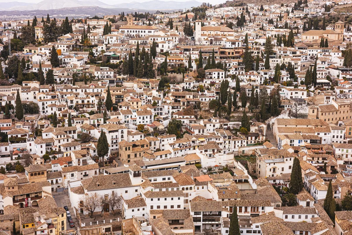 Whitewashed houses and lanes of the Albaicín seen from above