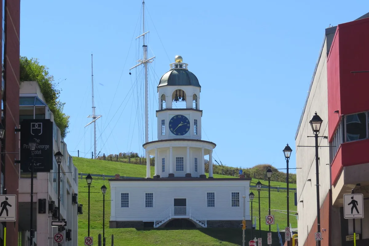 The Old Town Clock on Citadel Hill, the grassy fort slope rising behind it