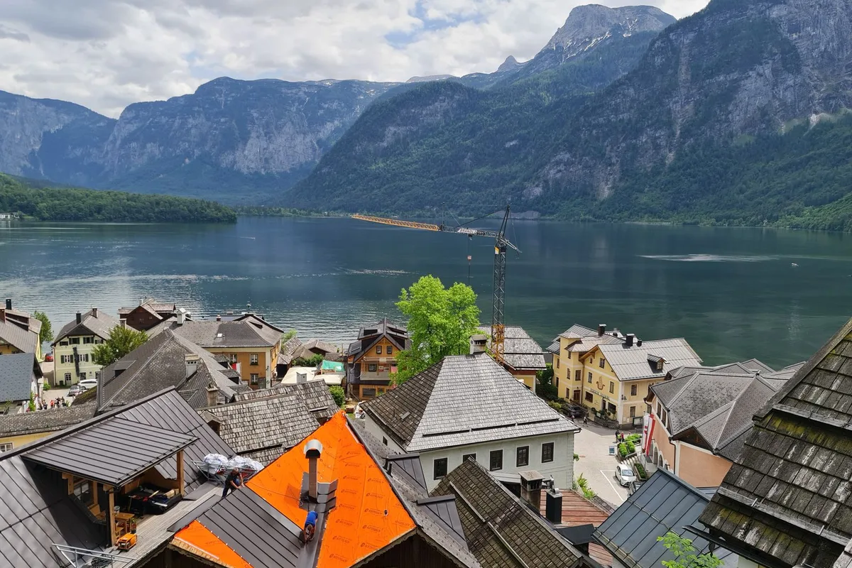 Rooftops of Hallstatt's old town crowding the shore of the Hallstätter See