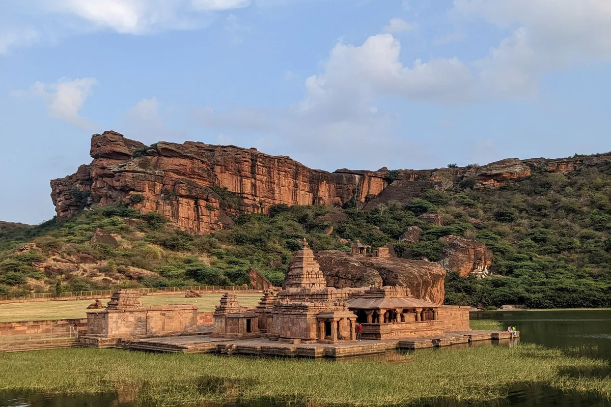 The Bhutanatha temples on Agastya Lake below the red cliffs of Badami