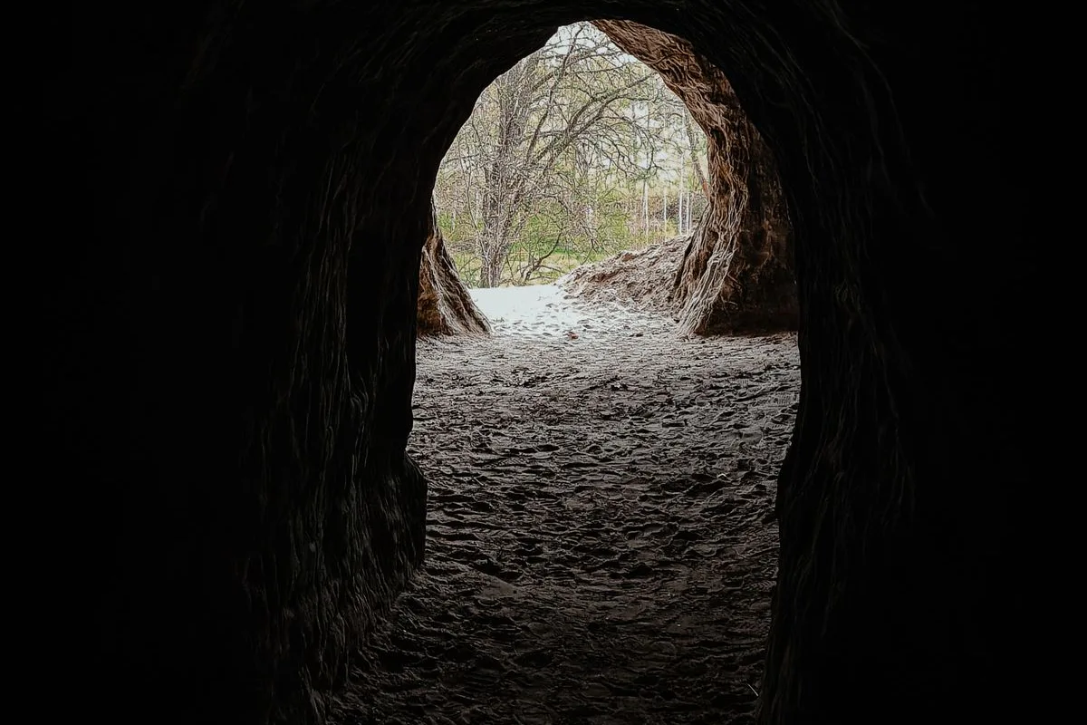 Inside a Cu Chi tunnel, looking towards the jungle light at the far end
