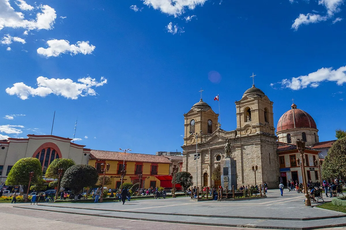 Huancayo Cathedral on Plaza Constitución under a blue Andean sky