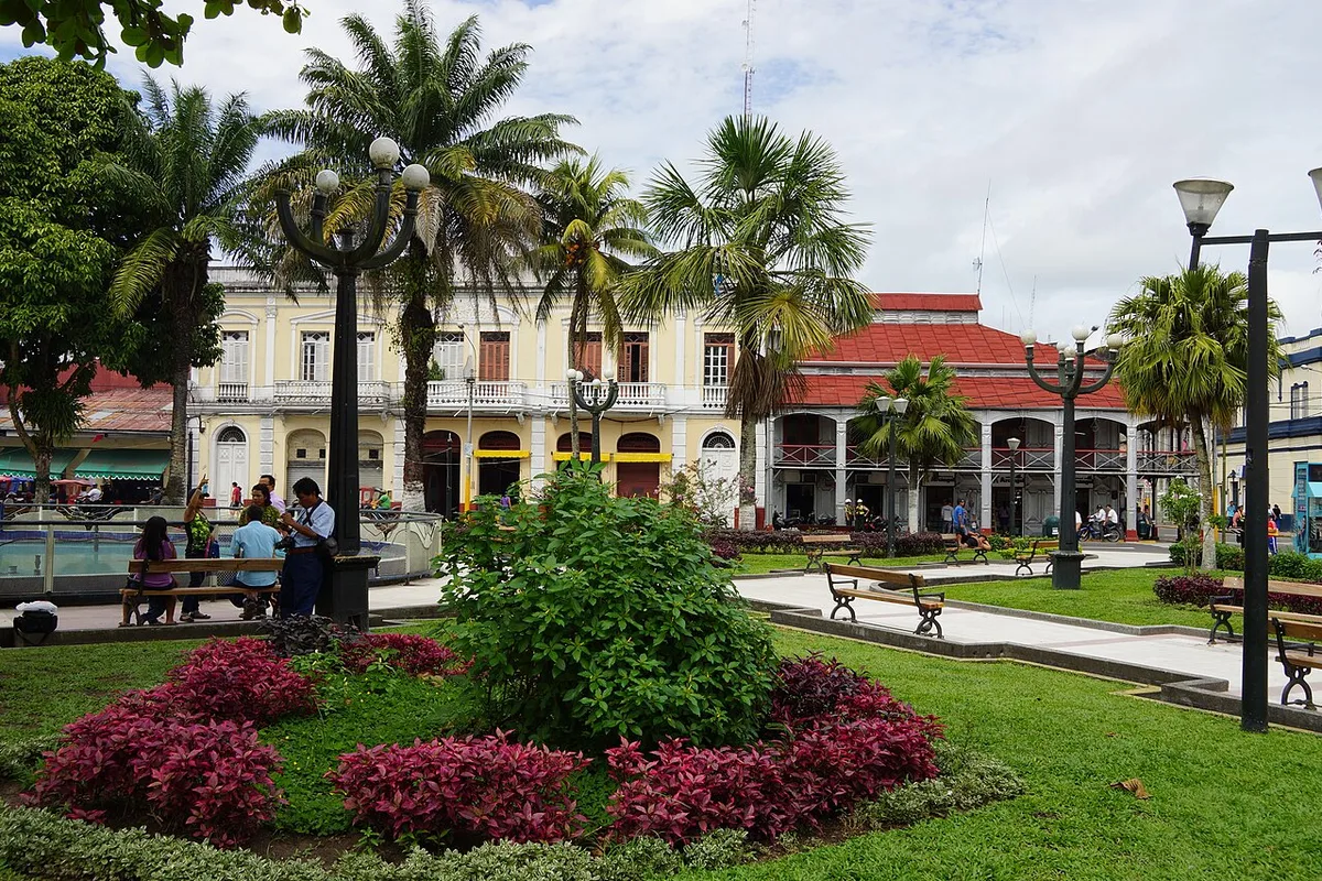 The Plaza de Armas in Iquitos, palms and gardens facing the rubber-boom era buildings