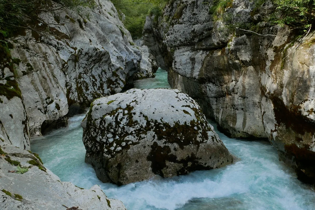 The emerald Soča river cutting through a limestone gorge