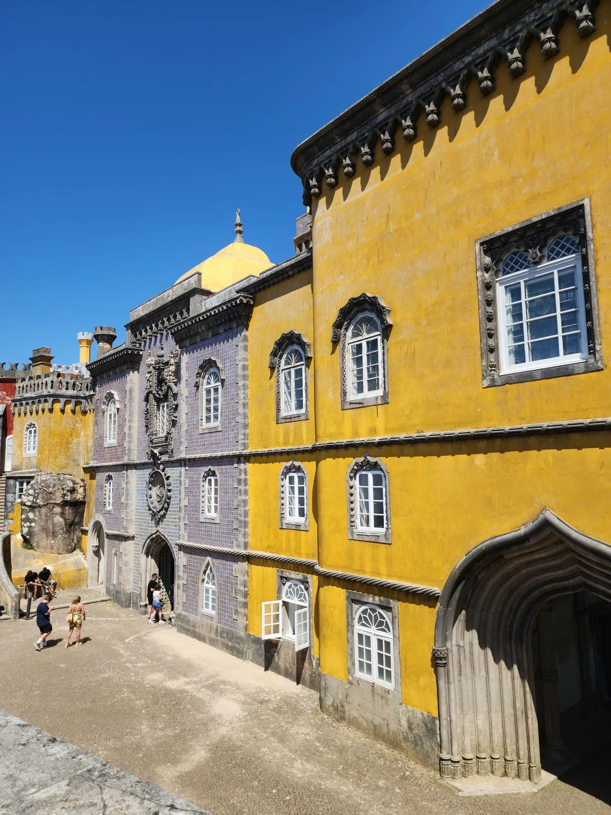 The colourful Pena Palace above the Sintra hills