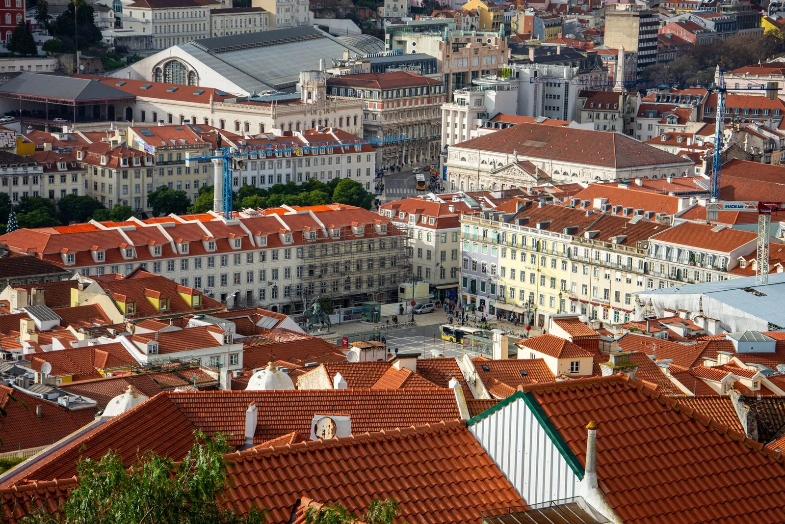 Lisbon rooftops and the Tagus in late spring light
