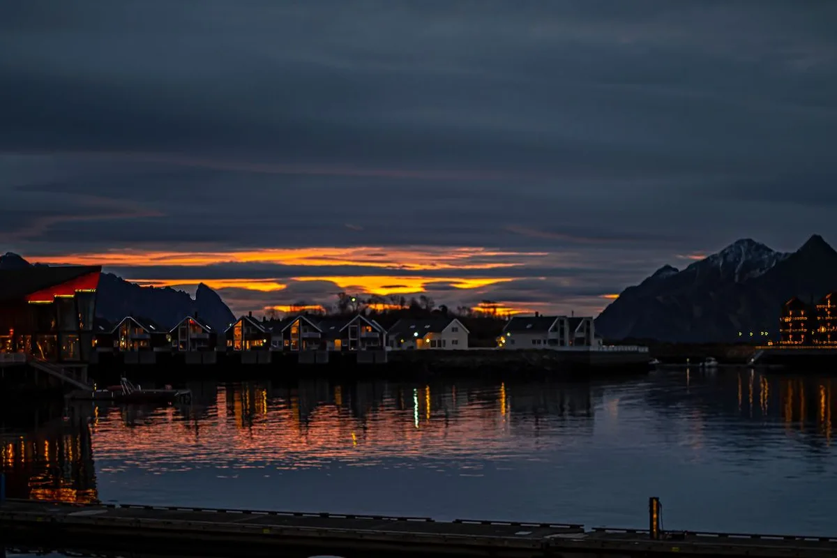 Dusk over the harbour in the dark season