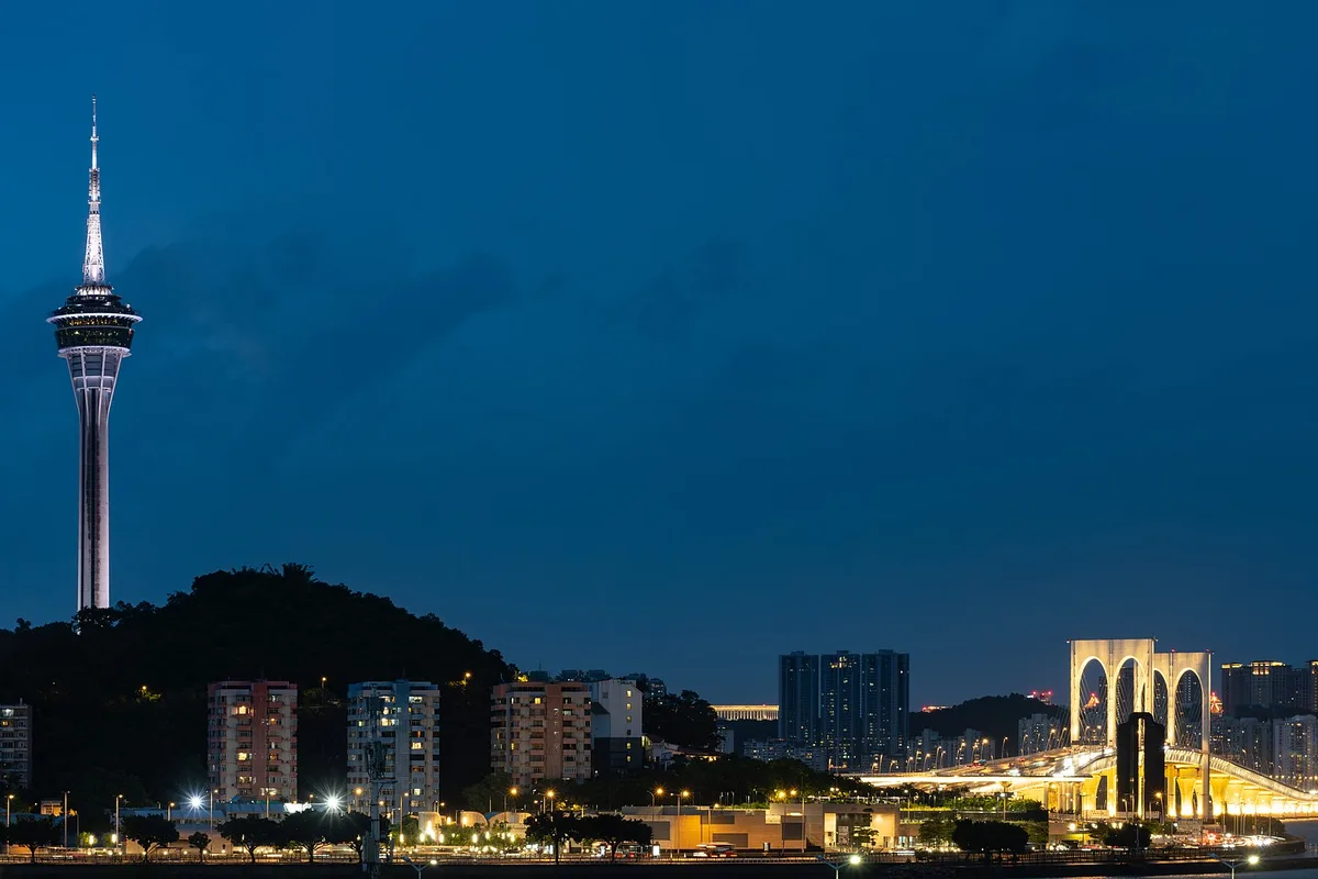 Macau Tower and the Sai Van Bridge lit up at blue hour