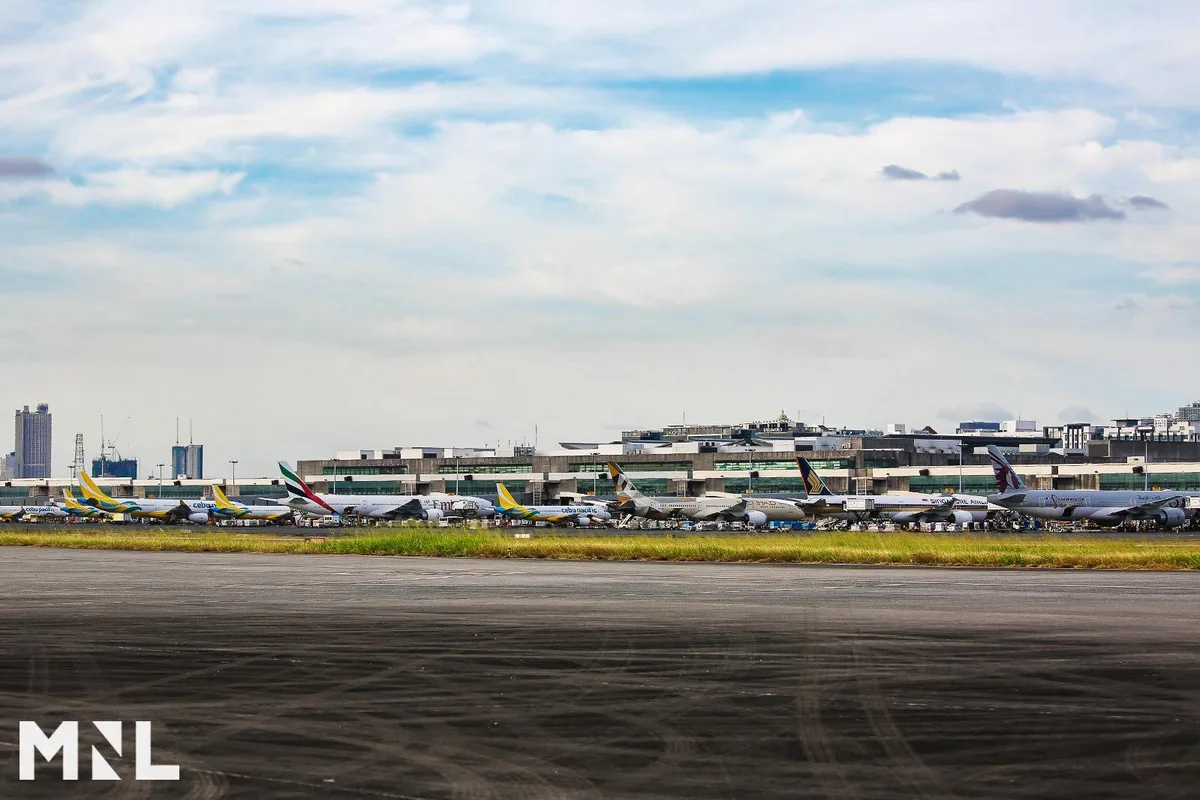 Jets from Cebu Pacific, Emirates, Etihad, Singapore Airlines and Qatar Airways parked at NAIA Terminal 3