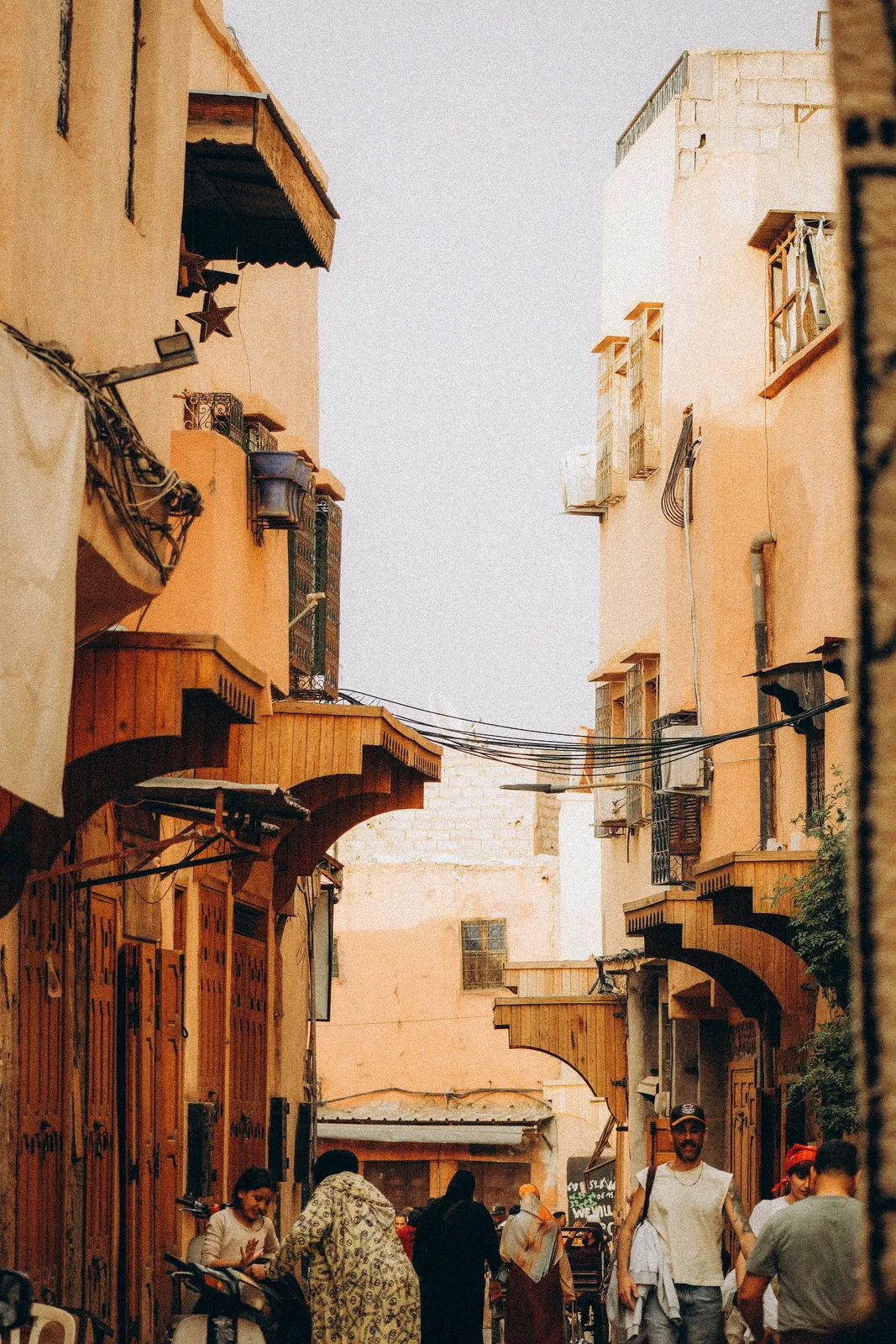 A shaded medina lane in warm light
