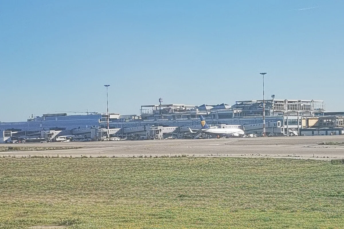 Bari Karol Wojtyła Airport terminal seen from the airfield, Matera's gateway 65 km away