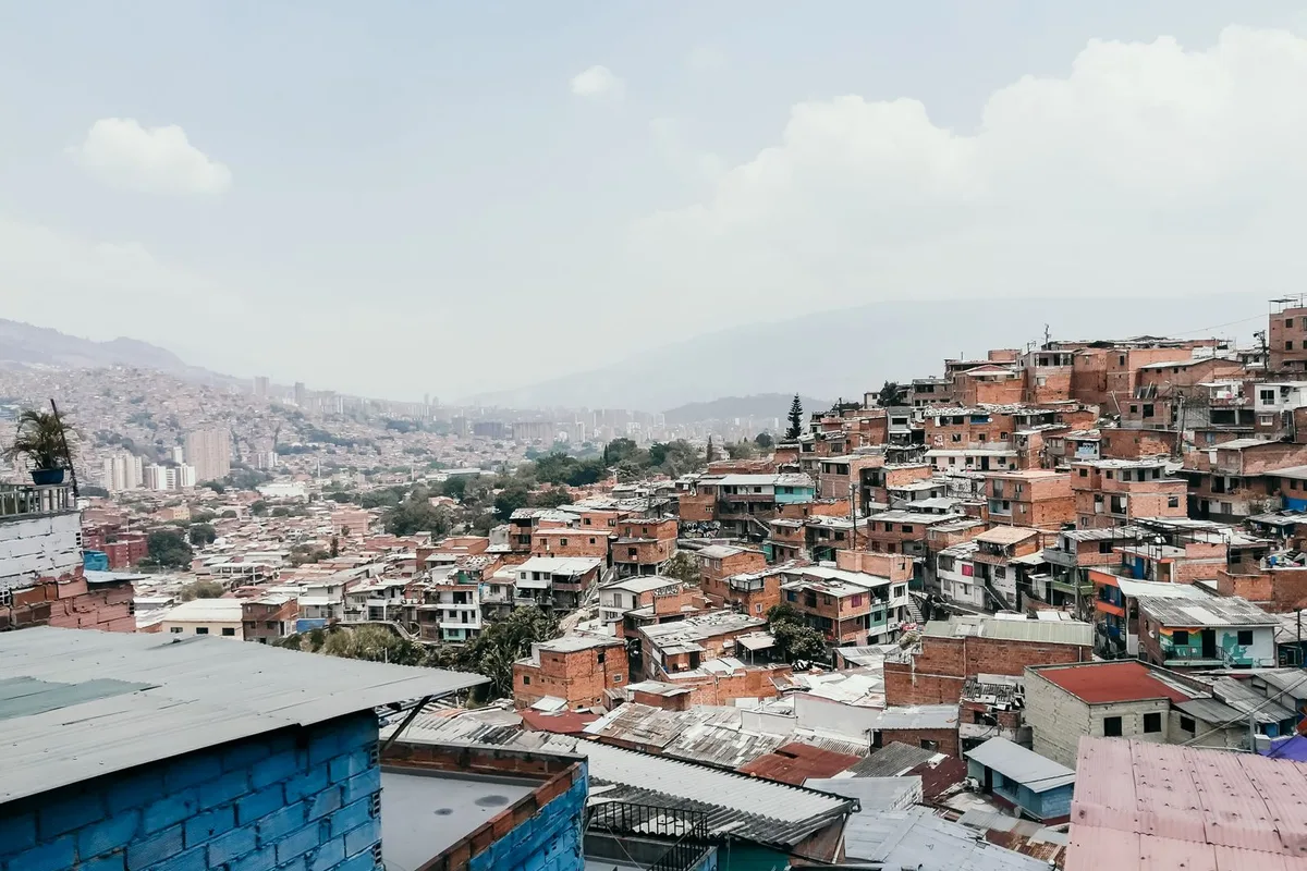 Brick homes stacked up a hillside in Comuna 13