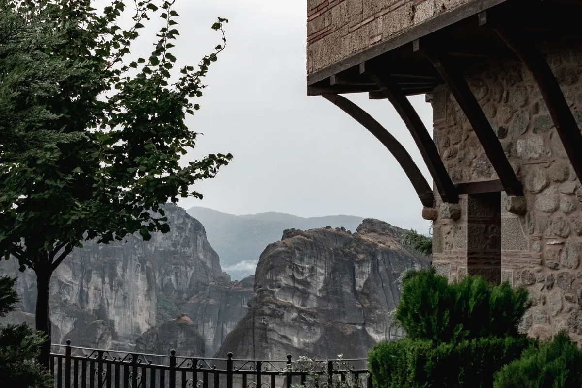 A monastery terrace overlooking the rock pillars