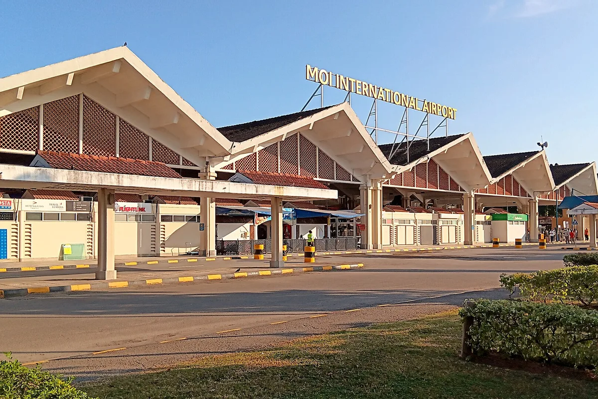 The terminal building of Moi International Airport in Mombasa, its name in blue letters above the entrance
