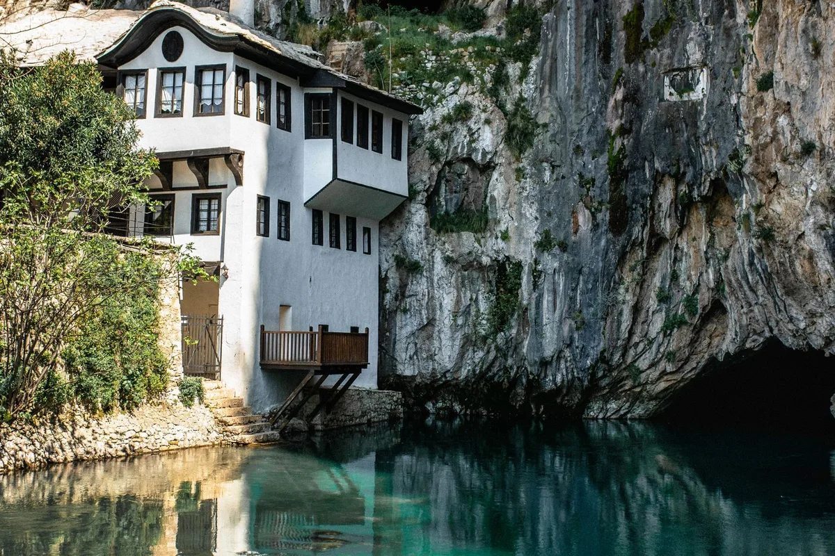 The Blagaj Tekija, the white Dervish house under the cliff at the source of the Buna River