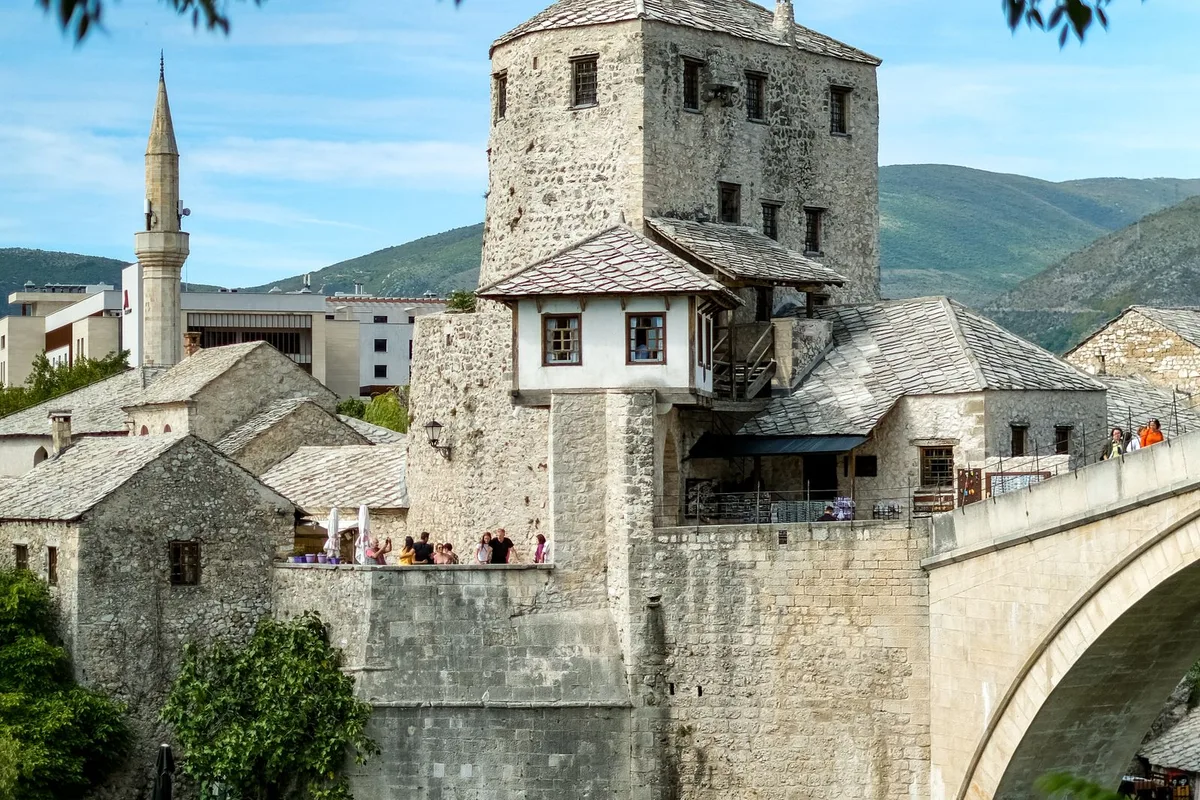 Stari Most and the Koski Mehmed Pasha Mosque from the east bank of the Neretva