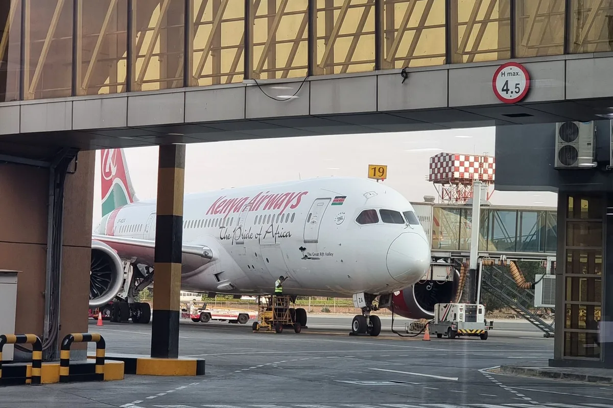 A plane at a jet bridge at Jomo Kenyatta International Airport, Nairobi