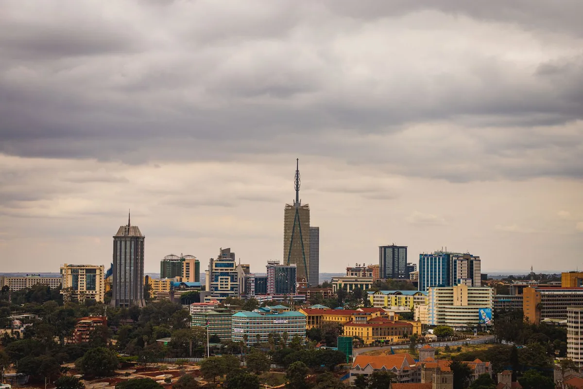 The Nairobi skyline under cloud, the KICC tower rising over the centre