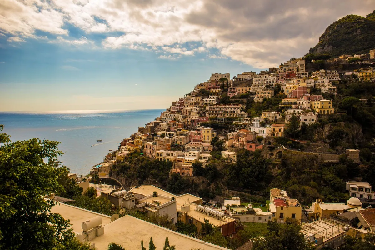Pastel houses stacked above the sea at Positano on the Amalfi Coast